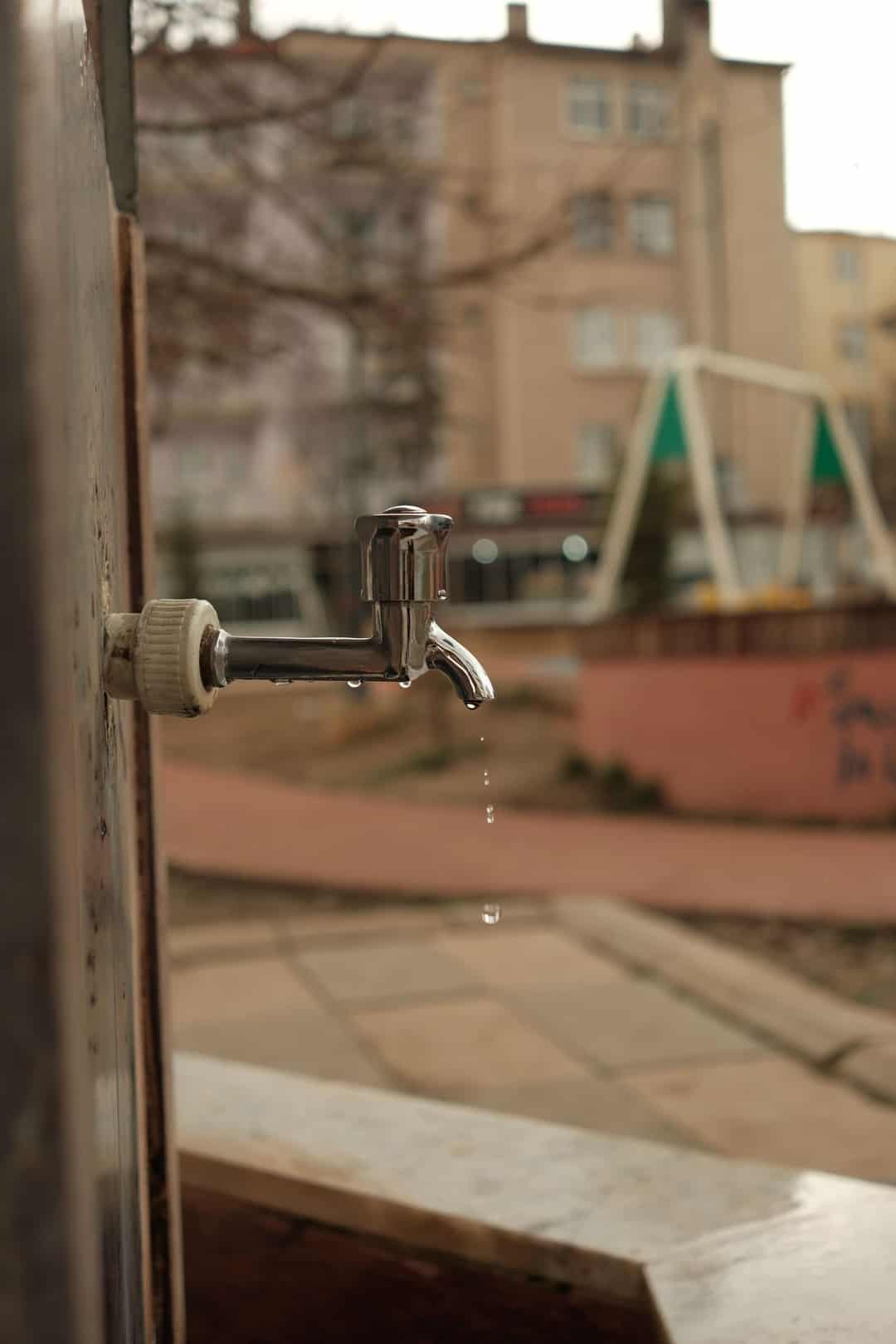 Outdoor faucet dripping water