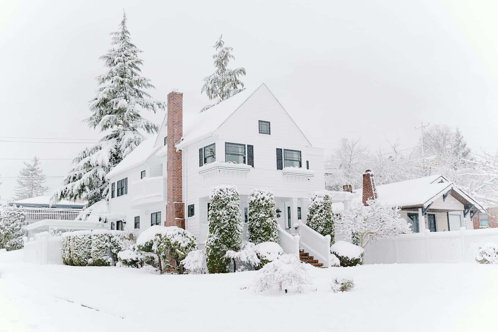 Houses covered in snow after a winter storm