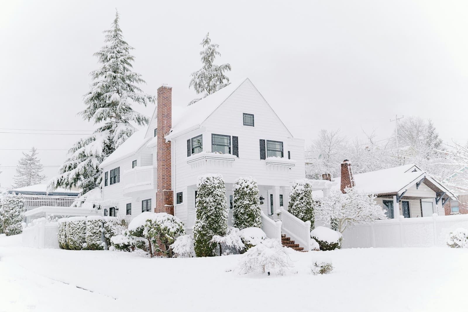 Houses covered in snow after a winter storm