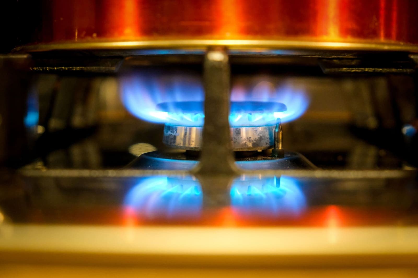 Blue flame on a gas stove burner
