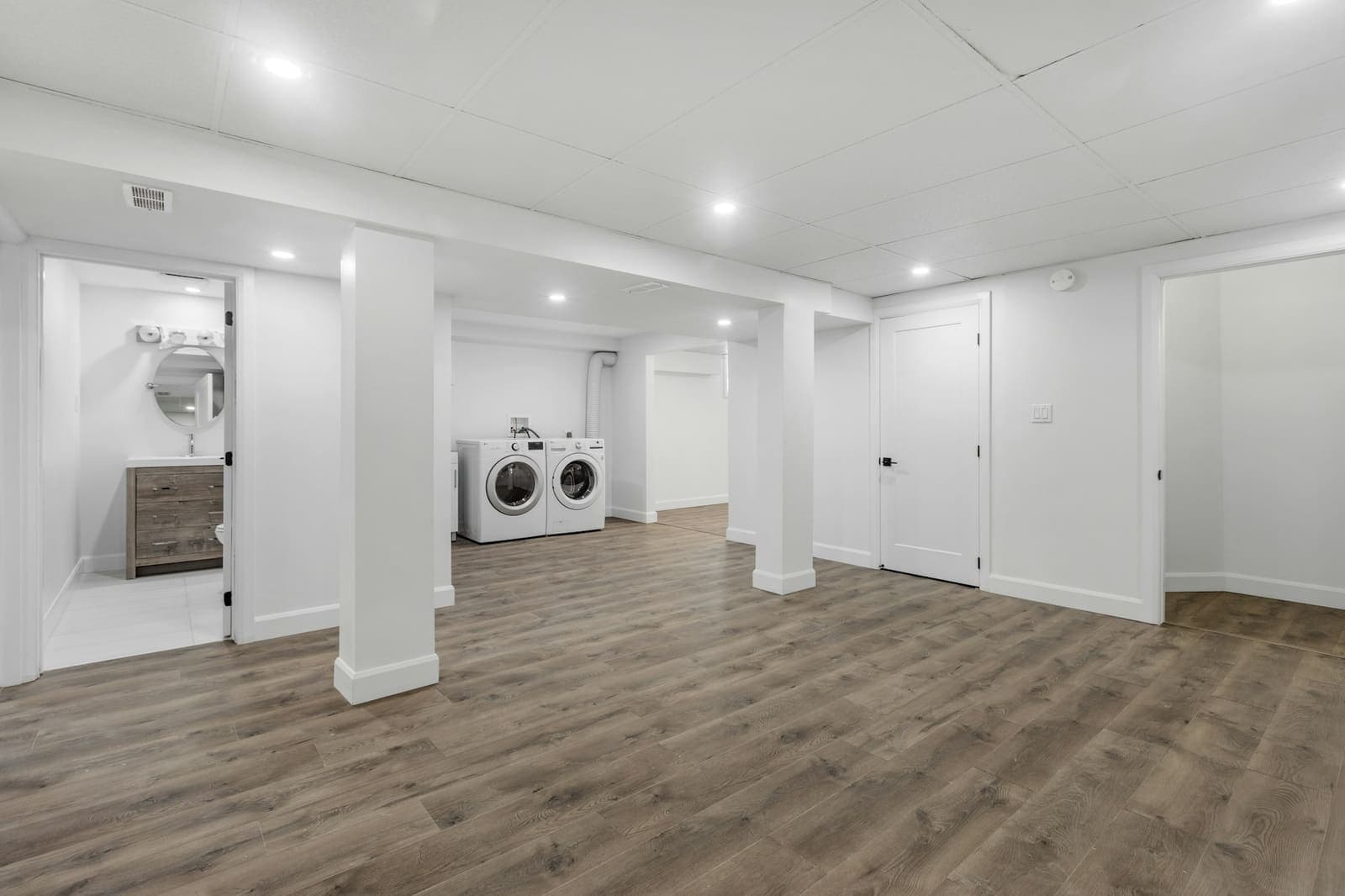 Finished basement with a washer and dryer